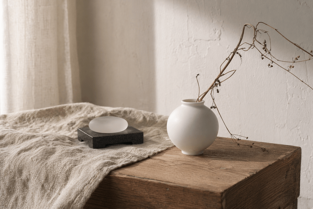 Moon jar forms and stonewall texture in Korean-made tableware.