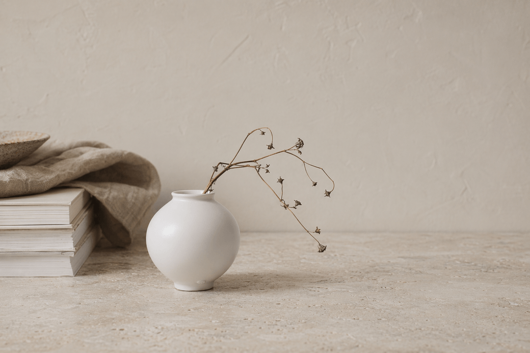 Korean handcrafted ceramic tableware with moon jar forms and stonewall texture references.